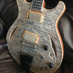 frost grey, grain highlighted quartersawn quilted maple